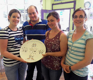 a group photo showing off a finished creation