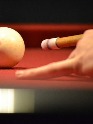 shooting pool